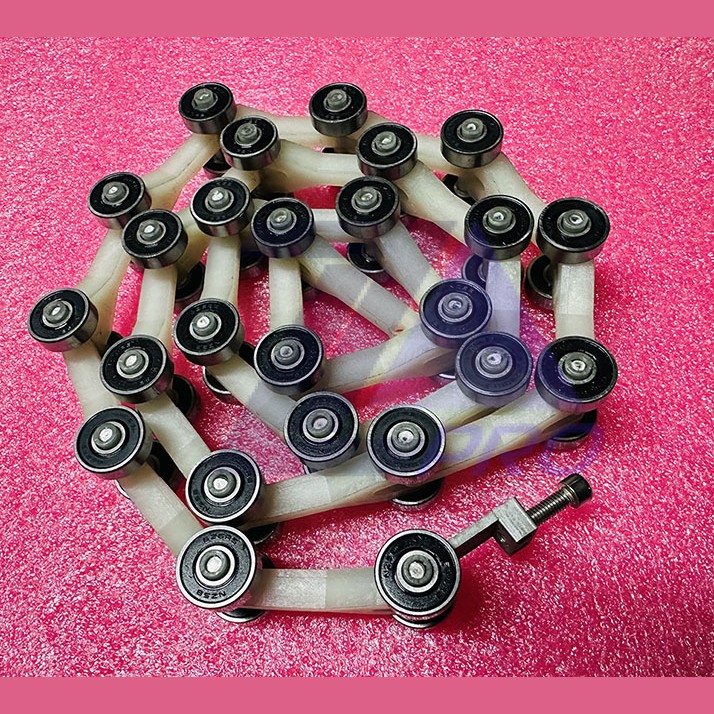 Цепь огибающая балюстрады поручня эскалатора L=1160мм, Y-звено, 25 пар роликов, шаг 45мм TravelMaster KM51176150V012 Kone